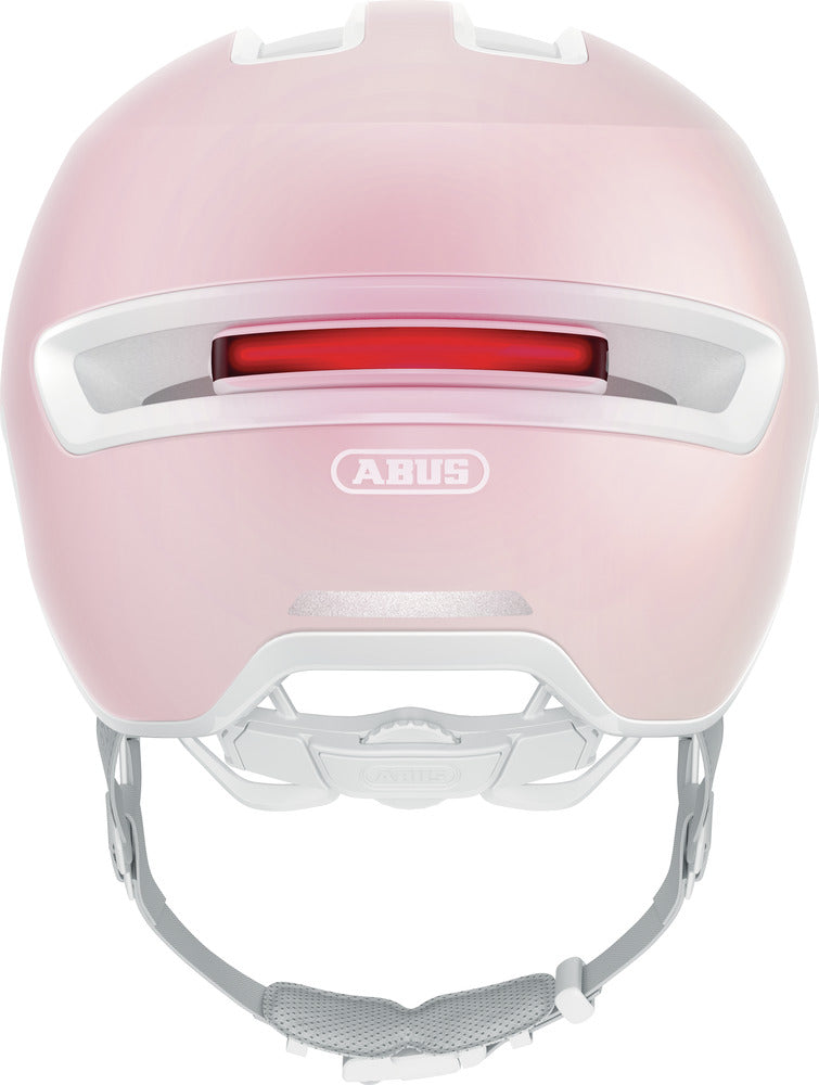 Abus hud-y pure rose. Lyserød cykelhjelm med LED lygte. Hvid skum